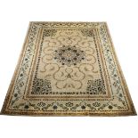 A KESHAN CARPET, PERSIA, MODERN the ivory field with a round floral skeleton medallion and