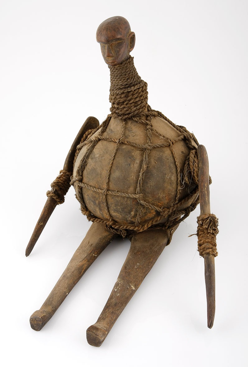 A SEKUMA/ NYAMWEZI RITUAL CALABASH, TANZANIA the ovoid body covered with rope windings,, carved