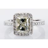 A DIAMOND RING centred with a claw-set radiant-cut diamond weighing 2.098cts, the conforming