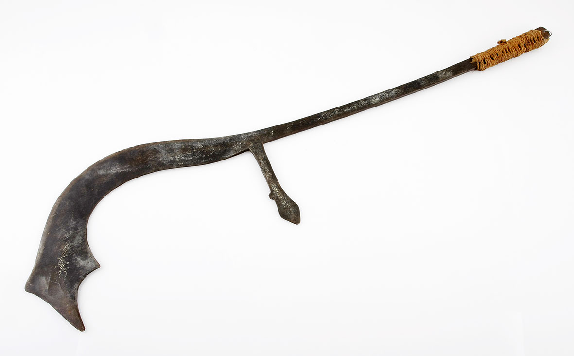 AN INGESSANA SCORPION THROWING KNIFE, SUDAN the steel blade sickle-shaped , handle covered with rope