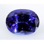 AN UNMOUNTED OVAL MIXED-CUT TANZANITE weighing 9.09cts Accompanied by a Tanzanite Foundation