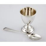 A CASED GEORGE V SILVER EGG CUP AND SPOON, J COLLYER, BIRMINGHAM, 1924 the plain ovoid bowl, on a