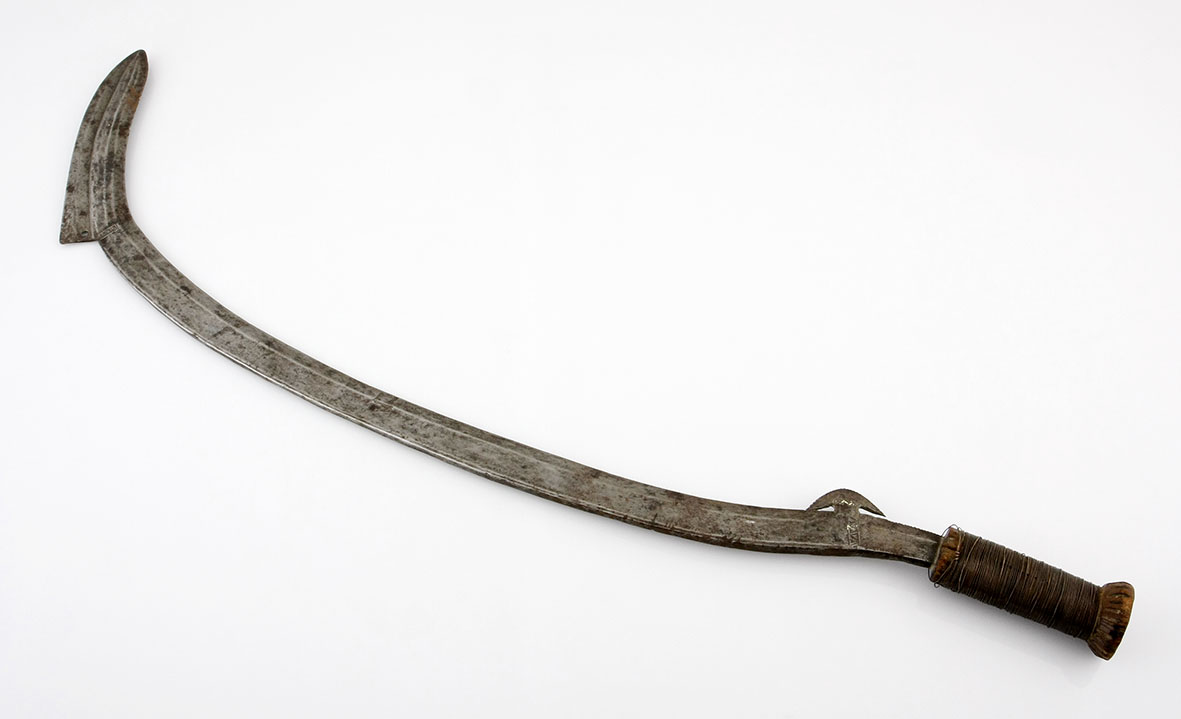 A BOA / ZANDE SABRE, SOUTHERN SUDAN the forged iron blade sickle-shaped , the wooden hilt with metal