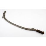 A BOA / ZANDE SABRE, SOUTHERN SUDAN the forged iron blade sickle-shaped , the wooden hilt with metal