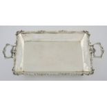 AN EDWARDIAN SILVER TWO-HANDLED TRAY, INDECIPHERABLE MAKER'S MARK, LONDON, 1902 the rectangular body