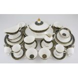 A ROYAL DOULTON 'CARLYLE' PATTERN PART DINNER AND TEA SERVICE, 1972 - 2001 each printed with a green