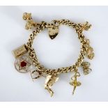 A CHARM BRACELET composed of a 9ct gold curb link chain suspending nine assorted charms in both