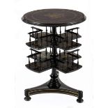 A LACQUERED AND BRASS INLAID OCCASIONAL TABLE the circular moulded top centred by a musical motif, a