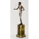 AN ART DECO SILVERED BRONZE AND CARVED IVORY FIGURE OF A FEMALE JUGGLER BY JOSEF LORENZL, CIRCA 1930
