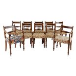 A SET OF TWELVE REGENCY STYLE MAHOGANY DINING CHAIRS, 19TH CENTURY comprising: ten dining chairs and