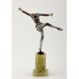 AN ART DECO COLD-PAINTED SILVERED BRONZE AND CARVED IVORY FIGURE OF A DANCER BY JOSEF LORENZL, CIRCA