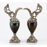 A PAIR OF CONTINENTAL METAL MOUNTED IRIDESCENT GLASS EWERS, LATE 19TH CENTURY attributed to Pallme-