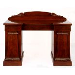 A VICTORIAN MAHOGANY PEDESTAL SIDEBOARD the shaped breakfront top above a pair of short drawers,