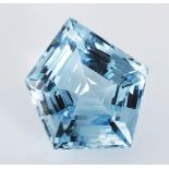 AN UNMOUNTED STEP-CUT BLUE TOPAZ weighing approximately 150.44cts