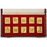 A CASED SET OF GOLD PLAQUES, THE TEN COMMANDMENTS TRETCHIKOFF each rectangular plaque depicting