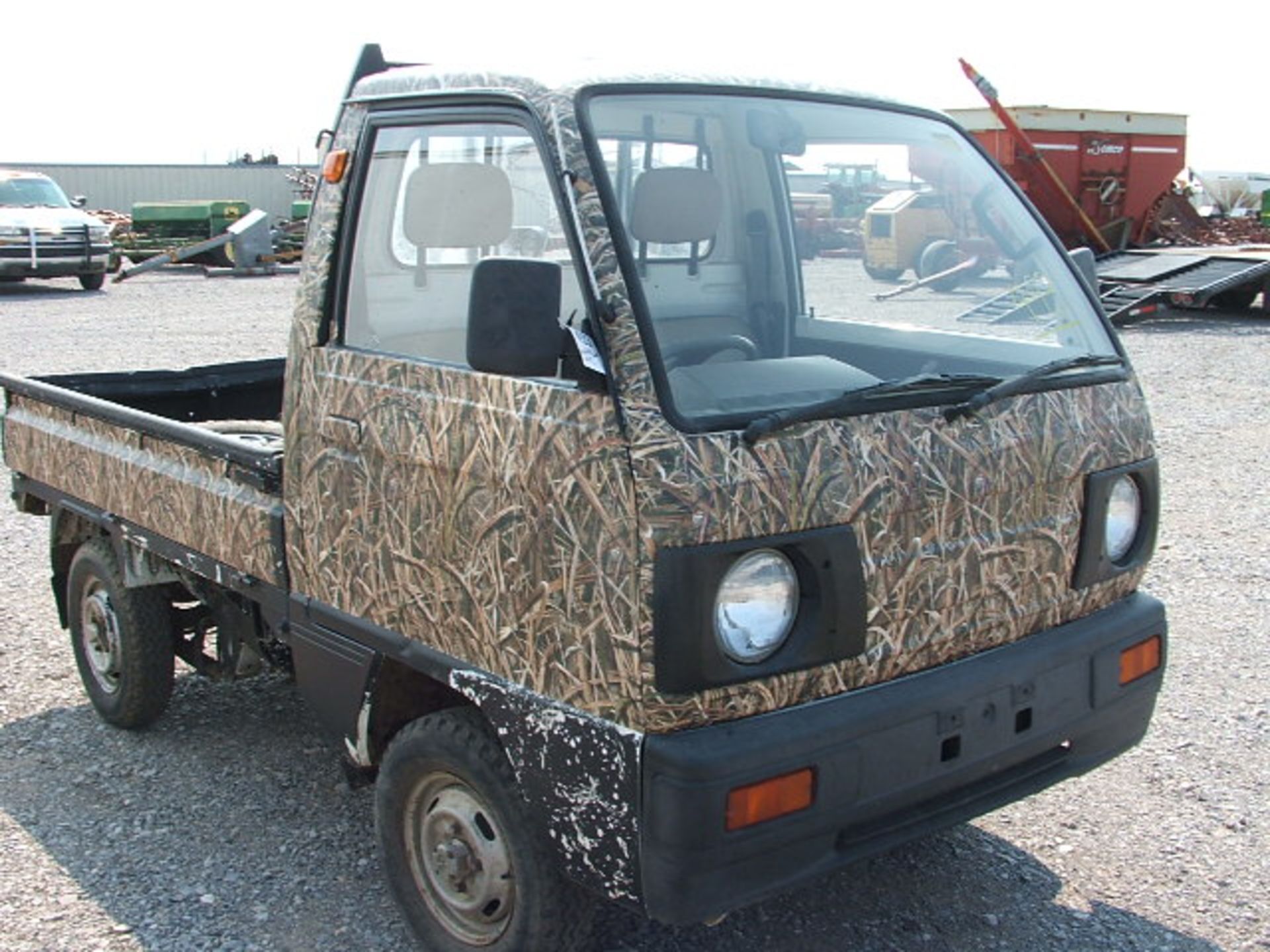 Lot 493 - Lot 493 Mazda Mini Truck - 4 speed - 4x4 -6' Bed - 68,000 miles. Extra set of tires. Â