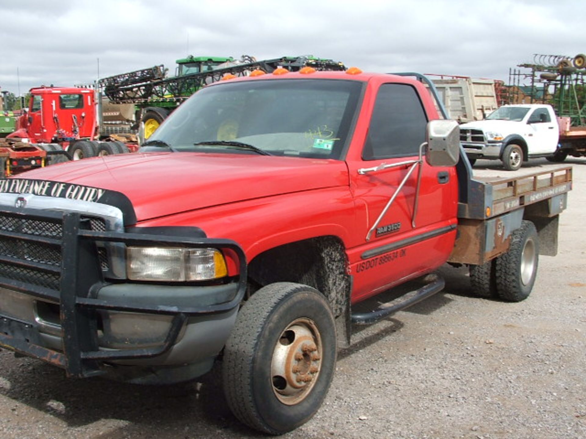 Lot 443 - Lot 443 1999 Dodge 1T Dually 4x4 5spd w/Flatbed. Â 85,000 miles