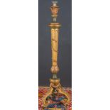 CANDELABRO TORCHERO. Estilo Luis XVI en madera dorada y policromada. Altura: 156 cm