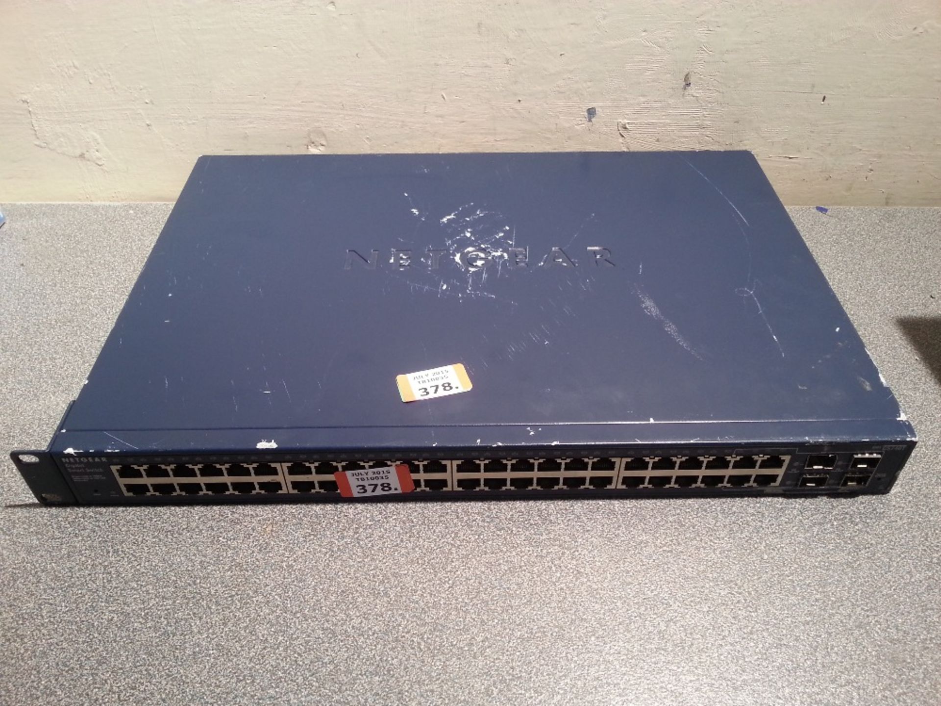 NETGEAR GS748T 48 Port 10/100/1000 Switch - 1U Rackmount - Missing Rack Ear - Powers on