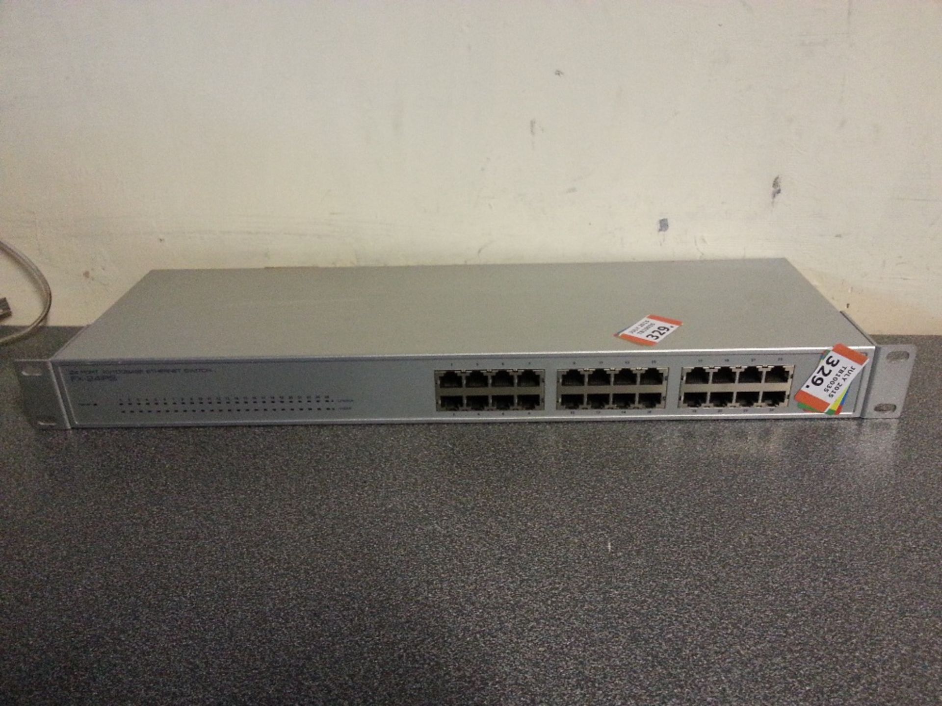 PCI FX-24IRS 24 Port 10/100 Network Switch - 1U Rackmount - Powers On