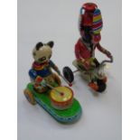 2 tin plate clockwork toys