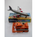 Boxed battery operated jet plane and vintage toy vehicle