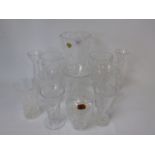 A collection of crystal glass vases.