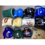 12 assorted advertising pub water jugs