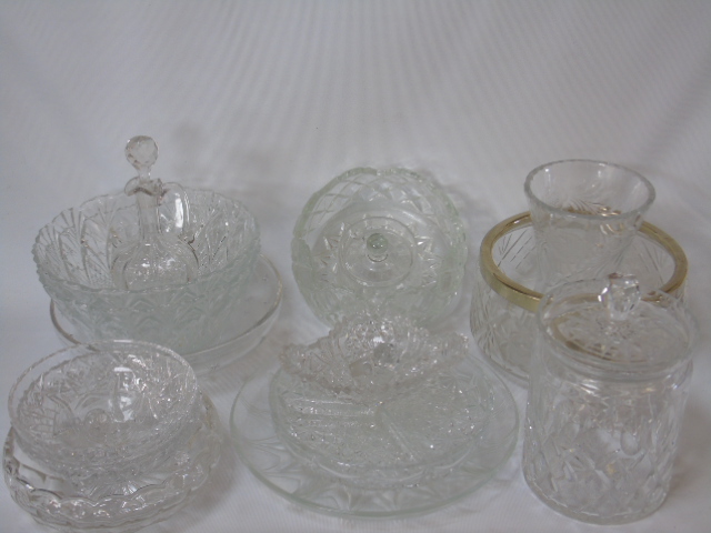 A collection of glassware items comprising bowls, dishes etc