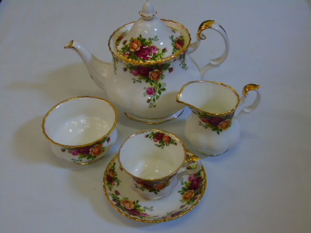 A Royal Albert 4 place tea service in Old Country Roses pattern