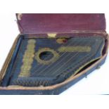 An antique zither in case