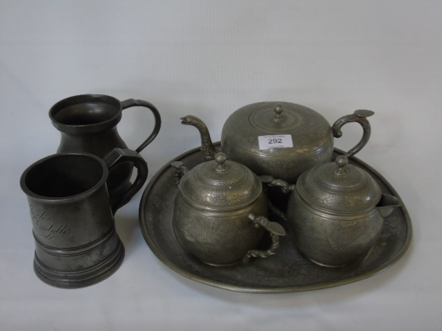 A 4 Piece oriental pewter tea service plus 2 antique pewter tankards