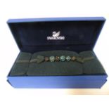 Swarovski necklace in presentation box with black and blue crystal beads