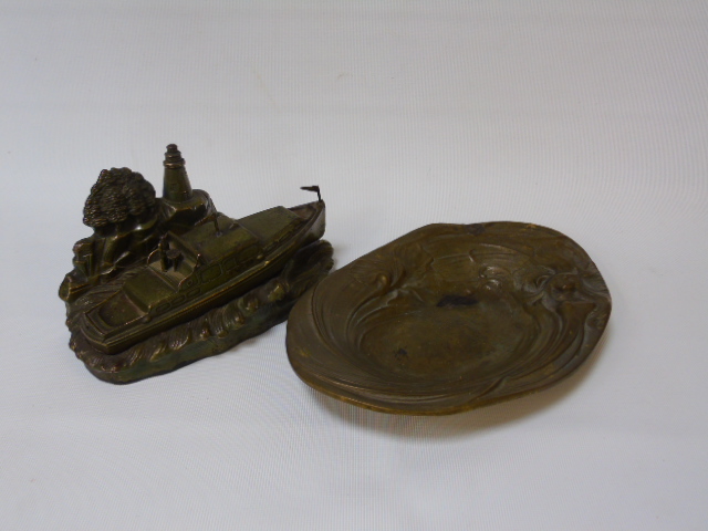 Art nouveau bronzed dish and a metal ornament of a boat at sea