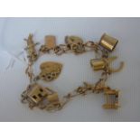 9ct gold charm bracelet.  Approx weight 18g