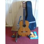 An Alhambra Spanish guitar, numbered inside sound hole - 006007 . Plus soft case and accessories