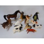 12 china figures of animals to include a Beswick horse