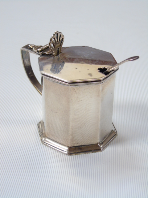 Silver mustard pot date mark Chester 1911 and a silver spoon