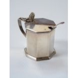 Silver mustard pot date mark Chester 1911 and a silver spoon