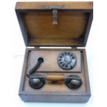 An old dial telephone in wooden case (with modern conversion)