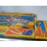 3 boxed matchbox superfast track sets plus one by hot wheels (no cars are included)