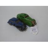 A Schuco tin plate clockwork car plus 1 other