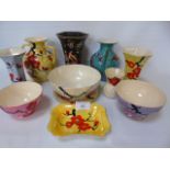 A collection of Arcadian china items with floral designs to include vases, bowls etc