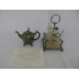 4 bottle plated cruet and a small octagional pewter tea pot.