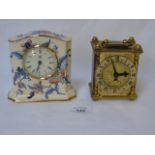 Brass carriage clock and a Masons porcelain clock