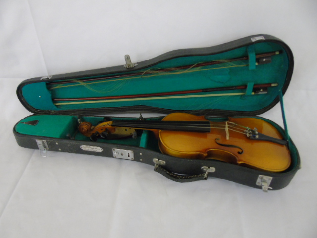 Cased violin.