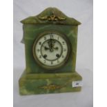 Onyx cased mantle clock approx 11" tall with open escapement.