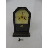 Antique wooden cased clock.