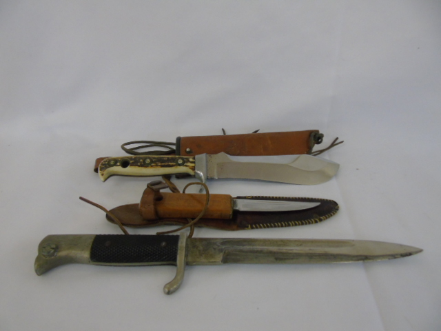 6 various hunting knives and a German WWII bayonette