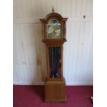 Reproduction oak grandmother clock with Westminster chime and moon phase dial